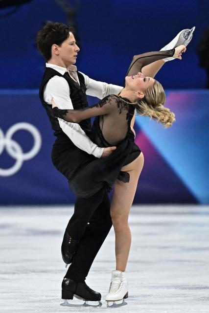 USA's Vadym Kolesnik and USA's Emilea Zingas compete in the figure skating ice dance-free dance final during the Milano Cortina 2026 Winter Olympic Games at Milano Ice Skating Arena in Milan on February 11, 2026. (Photo by Gabriel BOUYS / AFP)