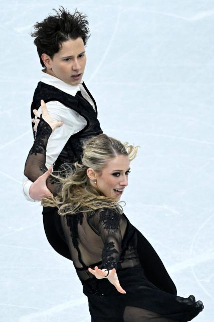USA's Emilea Zingas and Vadym Kolesnik compete in the figure skating ice dance-free dance final during the Milano Cortina 2026 Winter Olympic Games at Milano Ice Skating Arena in Milan on February 11, 2026. (Photo by WANG Zhao / AFP)