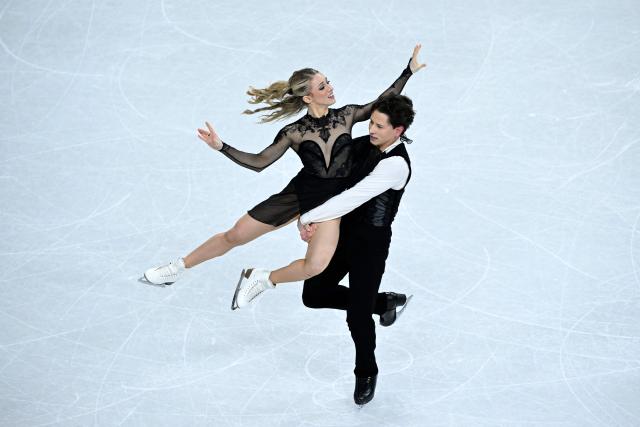 USA's Emilea Zingas and Vadym Kolesnik compete in the figure skating ice dance-free dance final during the Milano Cortina 2026 Winter Olympic Games at Milano Ice Skating Arena in Milan on February 11, 2026. (Photo by WANG Zhao / AFP)