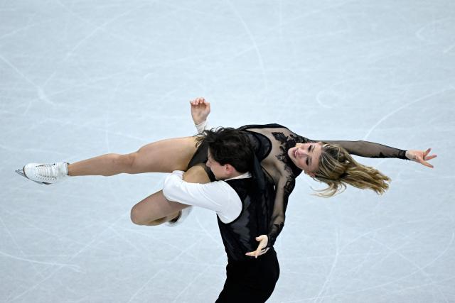USA's Emilea Zingas and Vadym Kolesnik compete in the figure skating ice dance-free dance final during the Milano Cortina 2026 Winter Olympic Games at Milano Ice Skating Arena in Milan on February 11, 2026. (Photo by WANG Zhao / AFP)