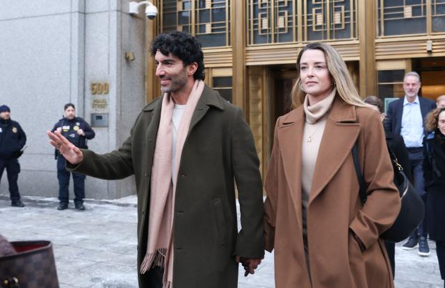 US actor and director Justin Baldoni leaves federal court holding hands with his wife Emily Baldoni following a court-ordered settlement conference in his ongoing legal dispute with actress Blake Lively related to the film "It Ends With Us," in New York on February 11, 2026. (Photo by ANGELA WEISS / AFP)