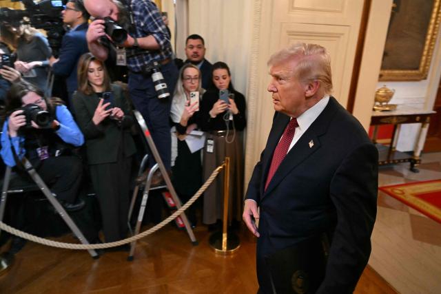 US President Donald Trump arrives to speak at a "Champion of Coal" event at the White House in Washington, DC, on February 11, 2026. (Photo by SAUL LOEB / AFP)