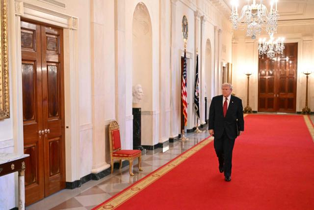 US President Donald Trump arrives to speak at a "Champion of Coal" event at the White House in Washington, DC, on February 11, 2026. (Photo by SAUL LOEB / AFP)