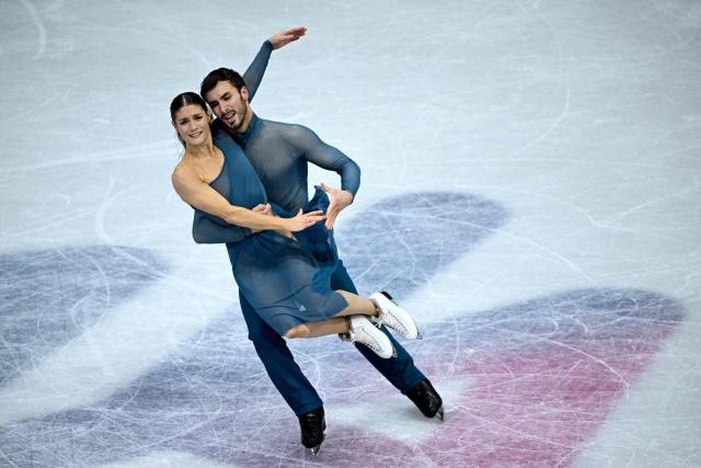 France's Laurence Fournier Beaudry and Guillaume Cizeron compete in the figure skating ice dance-free dance final during the Milano Cortina 2026 Winter Olympic Games at Milano Ice Skating Arena in Milan on February 11, 2026. (Photo by WANG Zhao / AFP)