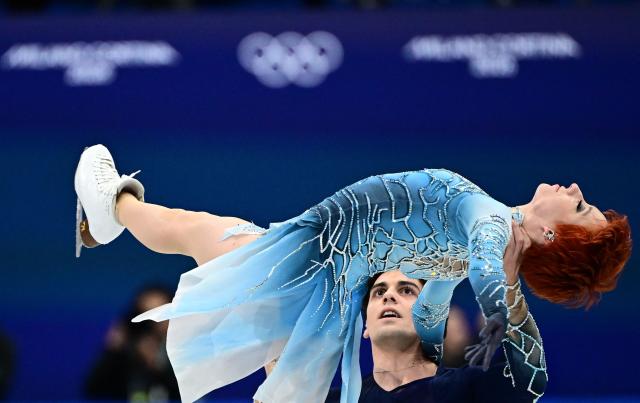 France's Evgeniia Lopareva and France's Geoffrey Brissaud compete in the figure skating ice dance-free dance final during the Milano Cortina 2026 Winter Olympic Games at Milano Ice Skating Arena in Milan on February 11, 2026. (Photo by JULIEN DE ROSA / AFP)