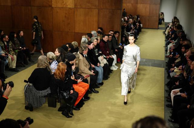 A model walks the runway during the Tory Burch Fall 2026 Collection fashion show in New York, on February 11, 2026. (Photo by CHARLY TRIBALLEAU / AFP)