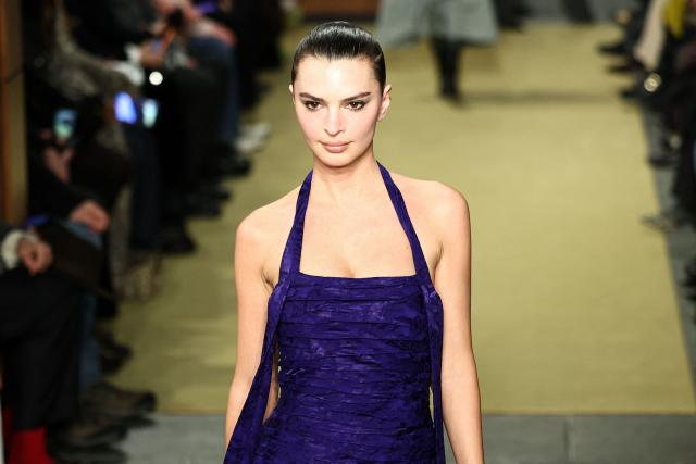 US model Emily Ratajkowski walks the runway during the Tory Burch Fall 2026 Collection fashion show in New York, on February 11, 2026. (Photo by CHARLY TRIBALLEAU / AFP)