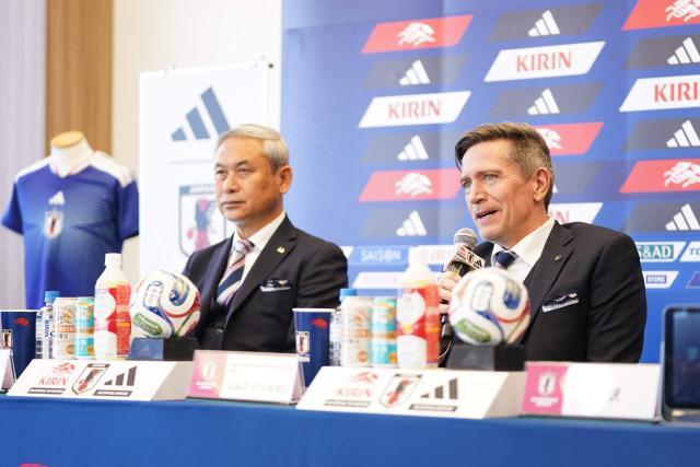 Japan women's national football team head coach Nils Nielsen (R) and Japan Football Association Women's Committee Chair Norio Sasaki attend a press conference to announce AFC Women’s Asian Cup squad in Tokyo on February 12, 2026. (Photo by Kazuhiro NOGI / AFP)