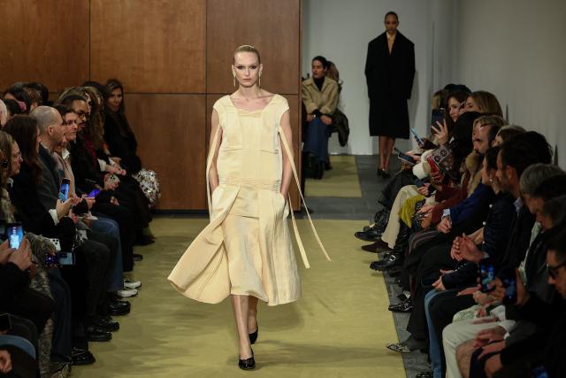 US model Alex Consani walks the runway during the Tory Burch Fall 2026 Collection fashion show in New York, on February 11, 2026. (Photo by CHARLY TRIBALLEAU / AFP)