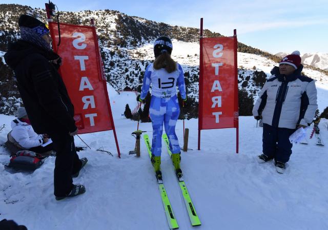 An alpine skier competes in the Central Asian Cup, the alpine skiing competition bringing together athletes from Kyrgyzstan, Kazakhstan, Uzbekistan and Tajikistan, at the Kashka-Suu ski resort in the Ala-Archa National Park, some 30km from Bishkek, on January 28, 2026. (Photo by Vyacheslav OSELEDKO / AFP)