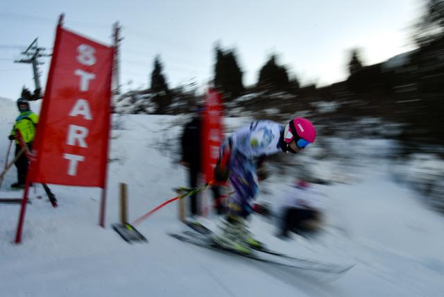 An alpine skier competes in the Central Asian Cup, the alpine skiing competition bringing together athletes from Kyrgyzstan, Kazakhstan, Uzbekistan and Tajikistan, at the Kashka-Suu ski resort in the Ala-Archa National Park, some 30km from Bishkek, on January 28, 2026. (Photo by Vyacheslav OSELEDKO / AFP)