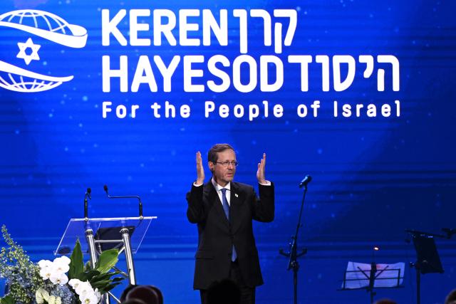 Israel’s President Isaac Herzog reacts during a Jewish community event in Melbourne on February 12, 2026. Herzog's tightly secured, four-day trip aims to console Australia's Jewish community after the December shooting at Sydney's Bondi Beach that killed 15 people at a Hanukkah festival. (Photo by WILLIAM WEST / AFP)