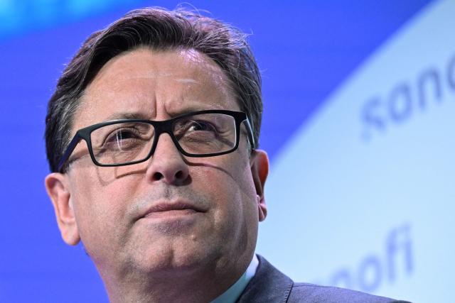 (FILES) Chief Executive Officer of French pharmaceutical group Sanofi, Paul Hudson looks on during the General Meeting of Shareholders, in Paris, on April 30, 2024. Sanofi’s CEO, Paul Hudson, will step down on February 17 after the group’s board decided on February 11, 2026 not to renew his term as a director, the global pharmaceutical giant announced on February 12, 2026. (Photo by MIGUEL MEDINA / AFP)