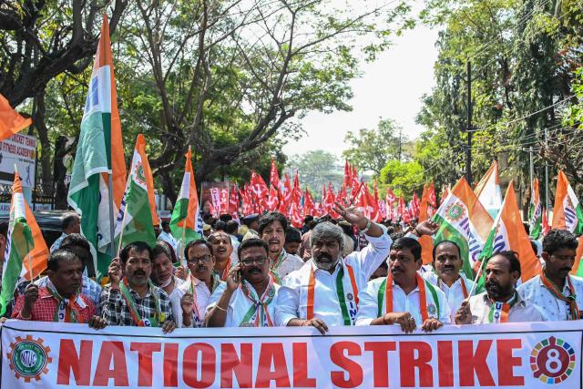 Members of trade unions and left political parties take part in a rally amid a nationwide strike over various issues in Hyderabad on February 12, 2026. (Photo by Noah SEELAM / AFP)