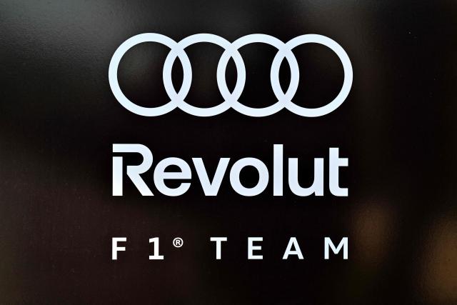 Audi's team logo is pictured on the first day of the Formula One pre-season testing at the Bahrain International Circuit in Sakhir on February 11, 2026.  (Photo by Giuseppe CACACE / AFP)