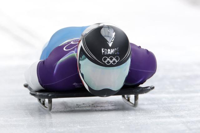France's Lucas Defayet competes in the skeleton men's heat 1 at Cortina Sliding Centre during the Milano Cortina 2026 Winter Olympic Games in Cortina d'Ampezzo on February 12, 2026. (Photo by Odd ANDERSEN / AFP)
