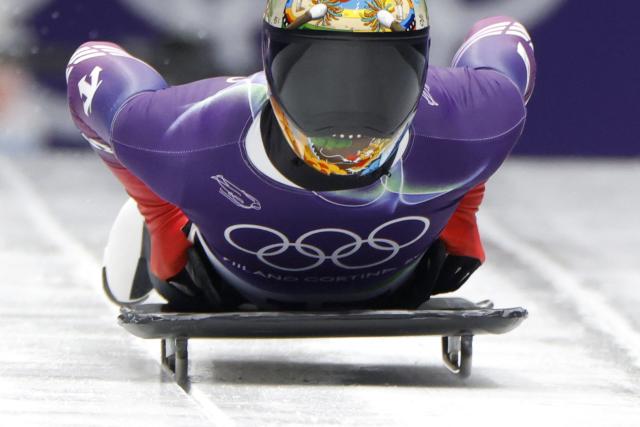 South Korea's Kim Jisoo competes in the skeleton men's heat 1 at Cortina Sliding Centre during the Milano Cortina 2026 Winter Olympic Games in Cortina d'Ampezzo on February 12, 2026. (Photo by Odd ANDERSEN / AFP)