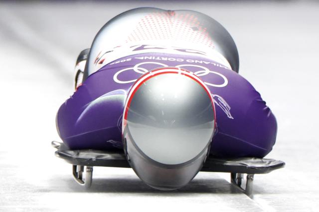Austria's Florian Auer competes in the skeleton men's heat 1 at Cortina Sliding Centre during the Milano Cortina 2026 Winter Olympic Games in Cortina d'Ampezzo on February 12, 2026. (Photo by Odd ANDERSEN / AFP)