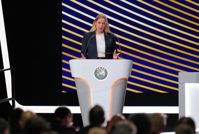 Royal Belgian Football Association Pascale Van Damme gestures as she addresses the 50th UEFA Ordinary Congress in Brussels on February 12, 2026. (Photo by Pau BARRENA / AFP)