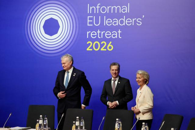 (FromL) Lithuania's President Gitanas Nauseda, Slovenia's Prime Minister  Robert Golob and  European Commission President Ursula von der Leyen react as they take part in the Informal EU Leaders' Retreat at the Alden Biesen Castle in Alden Biesen, central Belgium on February 12, 2026. (Photo by Ludovic MARIN / AFP)