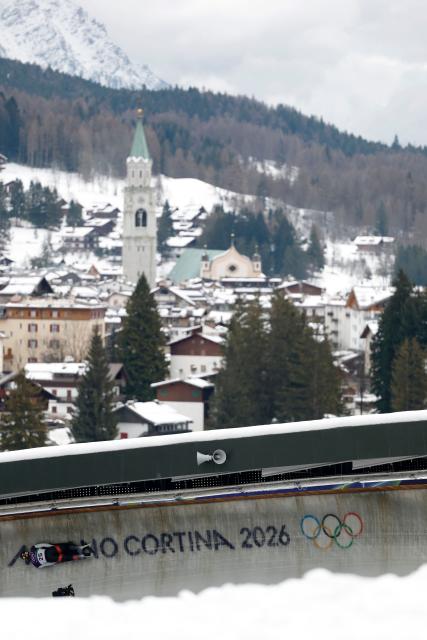 Japan's Hiroatsu Takahashi competes in the skeleton men's heat 2 at Cortina Sliding Centre during the Milano Cortina 2026 Winter Olympic Games in Cortina d'Ampezzo on February 12, 2026. (Photo by Odd ANDERSEN / AFP)