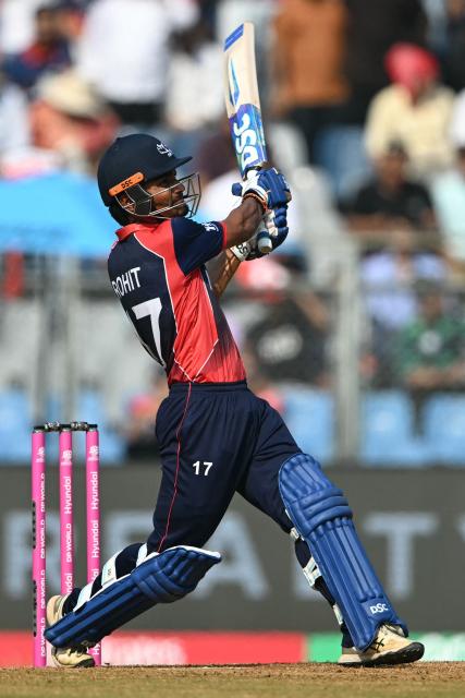 Nepal's captain Rohit Paudel plays a shot during the 2026 ICC Men's T20 Cricket World Cup group stage match between Nepal and Italy at the Wankhede Stadium in Mumbai on February 12, 2026. (Photo by Punit PARANJPE / AFP)