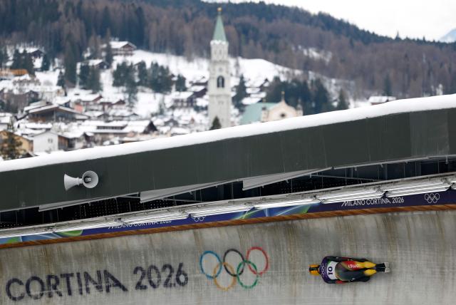 Germany's Christopher Grotheer competes in the skeleton men's heat 2 at Cortina Sliding Centre during the Milano Cortina 2026 Winter Olympic Games in Cortina d'Ampezzo on February 12, 2026. (Photo by Odd ANDERSEN / AFP)