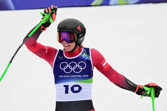 Austria's Cornelia Huetter reacts in the finish area of the women's super-G event during the Milano Cortina 2026 Winter Olympic Games at the Tofane Alpine Skiing Centre in Cortina d’Ampezzo on February 12, 2026. (Photo by Stefano RELLANDINI / AFP)