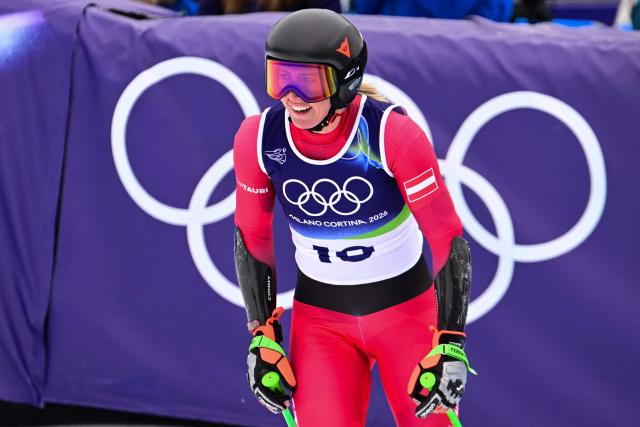 Austria's Cornelia Huetter reacts in the finish area of the women's super-G event during the Milano Cortina 2026 Winter Olympic Games at the Tofane Alpine Skiing Centre in Cortina d’Ampezzo on February 12, 2026. (Photo by Stefano RELLANDINI / AFP)