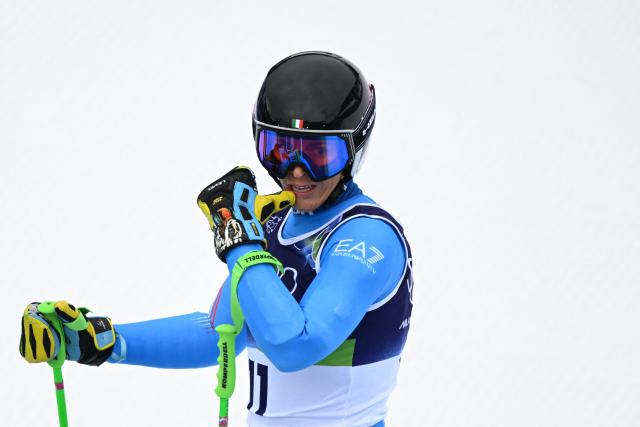 Italy's Elena Curtoni reacts in the finish area after competing in the women's super-G event during the Milano Cortina 2026 Winter Olympic Games at the Tofane Alpine Skiing Centre in Cortina d’Ampezzo on February 12, 2026. (Photo by Franзois-Xavier MARIT / AFP)