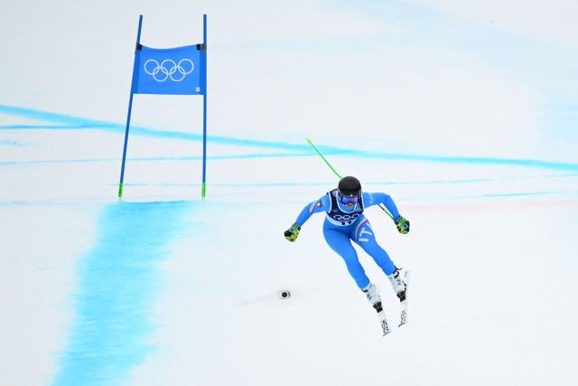 Italy's Elena Curtoni competes in the women's super-G event during the Milano Cortina 2026 Winter Olympic Games at the Tofane Alpine Skiing Centre in Cortina d’Ampezzo on February 12, 2026. (Photo by Franзois-Xavier MARIT / AFP)