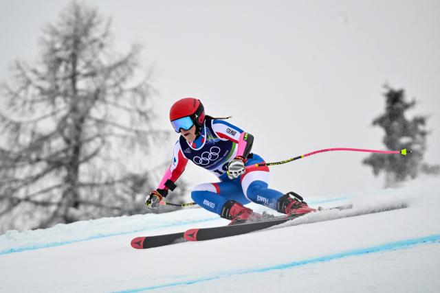 France's Camille Cerutti competes in the women's super-G event during the Milano Cortina 2026 Winter Olympic Games at the Tofane Alpine Skiing Centre in Cortina d’Ampezzo on February 12, 2026. (Photo by Tiziana FABI / AFP)
