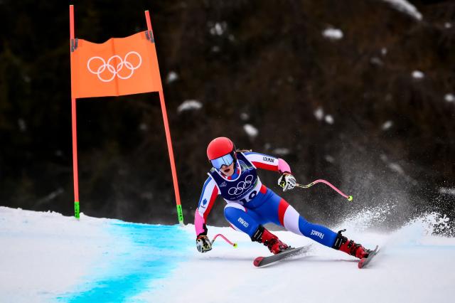 France's Camille Cerutti competes in the women's super-G event during the Milano Cortina 2026 Winter Olympic Games at the Tofane Alpine Skiing Centre in Cortina d’Ampezzo on February 12, 2026. (Photo by Marco BERTORELLO / AFP)