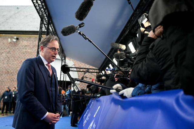 Belgium's Prime Minister Bart De Wever addresses the media as he arrives to attend the Informal EU Leaders' Retreat at the Alden Biesen Castle in Alden Biesen, central Belgium on February 12, 2026. (Photo by NICOLAS TUCAT / AFP)