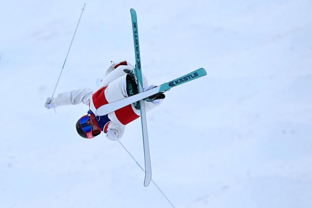 Canada's Julien Viel competes in the freestyle skiing men's moguls final 1 during the Milano Cortina 2026 Winter Olympic Games at Livigno Aerials & Moguls Park, in Livigno (Valtellina), on February 12, 2026. (Photo by Kirill KUDRYAVTSEV / AFP)