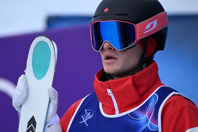 Canada's Julien Viel looks on in the freestyle skiing men's moguls final 1 during the Milano Cortina 2026 Winter Olympic Games at Livigno Aerials & Moguls Park, in Livigno (Valtellina), on February 12, 2026. (Photo by Kirill KUDRYAVTSEV / AFP)