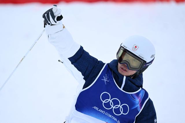 Japan's Ikuma Horishima reacts in the freestyle skiing men's moguls final 1 during the Milano Cortina 2026 Winter Olympic Games at Livigno Aerials & Moguls Park, in Livigno (Valtellina), on February 12, 2026. (Photo by Kirill KUDRYAVTSEV / AFP)