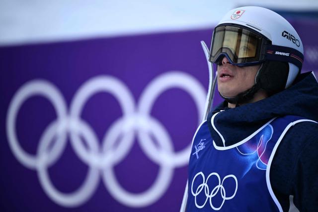 Japan's Ikuma Horishima reacts in the freestyle skiing men's moguls final 1 during the Milano Cortina 2026 Winter Olympic Games at Livigno Aerials & Moguls Park, in Livigno (Valtellina), on February 12, 2026. (Photo by Kirill KUDRYAVTSEV / AFP)