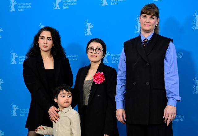 (L-R) actress Laila Mahmudi with actor Liam Hussaini, Afghan director and actress Shahrbanoo Sadat and producer Katja Adomeit pose during a photo call for the film "No Good Men" presented as Berlinale Special Gala at the 76th Berlinale, Europe's first major film festival of the year, in Berlin on February 12, 2026. (Photo by John MACDOUGALL / AFP)