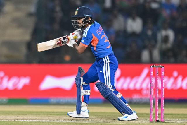 India's Ishan Kishan watches the ball after playing a shot during the 2026 ICC Men's T20 Cricket World Cup group stage match between India and Namibia at the Arun Jaitley Stadium in New Delhi on February 12, 2026. (Photo by Arun SANKAR / AFP)