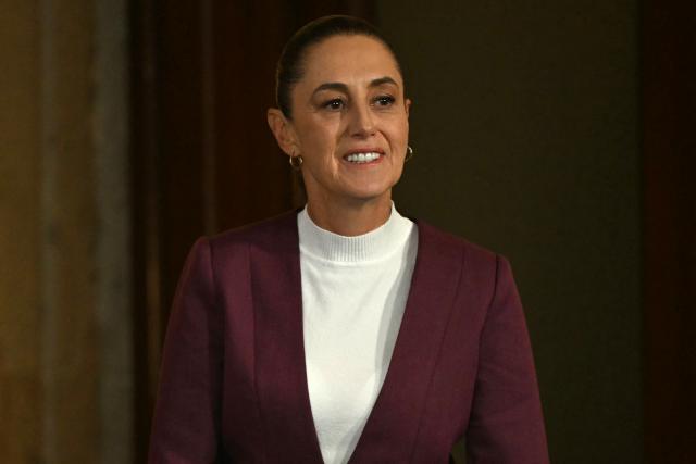 Mexico's President Claudia Sheinbaum arrives for her daily press conference at Palacio Nacional in Mexico City on February 12, 2026. (Photo by YURI CORTEZ / AFP)