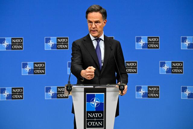 NATO Secretary General Mark Rutte speaks during a press conference on the sidelines of a defence ministers meeting of The North Atlantic Treaty Organisation (NATO) at NATO Headquarters in Brussels, on February 12, 2026. (Photo by JOHN THYS / AFP)