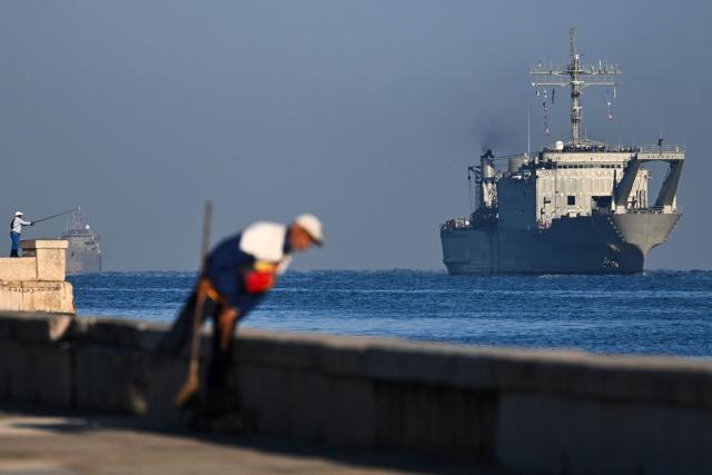 Mexican Navy ship ARM Papaloapan (R) arrives at Havana Bay with humanitarian aid, in Havana, on February 12, 2026. (Photo by YAMIL LAGE / AFP)