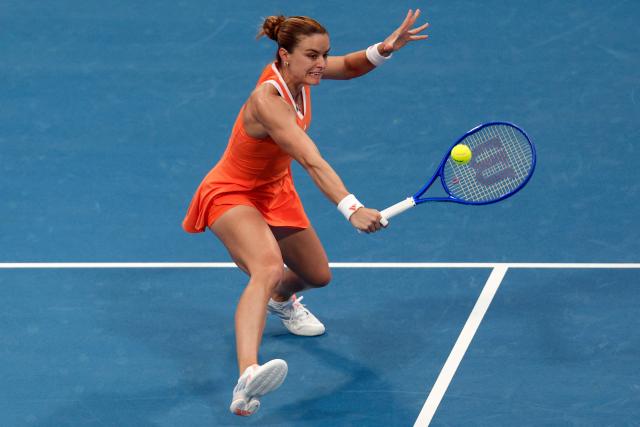 Greece's Maria Sakkari returns a shot during her women’s singles quarter-final match against Poland's Iga Swiatek at the Qatar Open tennis tournament in Doha on February 12, 2026. (Photo by Karim JAAFAR / AFP)