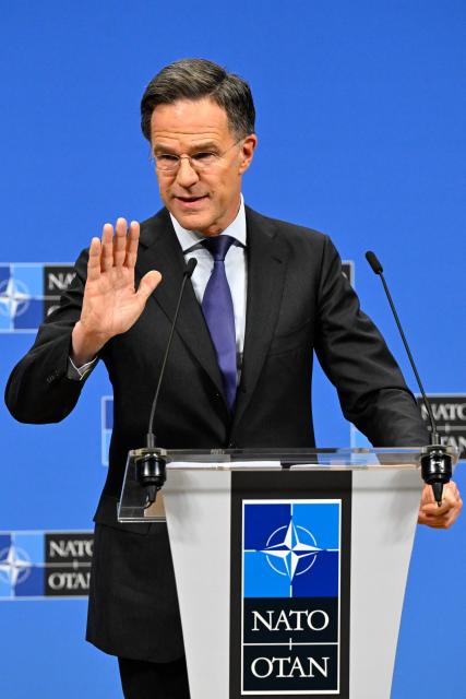 NATO Secretary General Mark Rutte speaks during a press conference on the sidelines of a defence ministers meeting of The North Atlantic Treaty Organisation (NATO) at NATO Headquarters in Brussels, on February 12, 2026. (Photo by JOHN THYS / AFP)