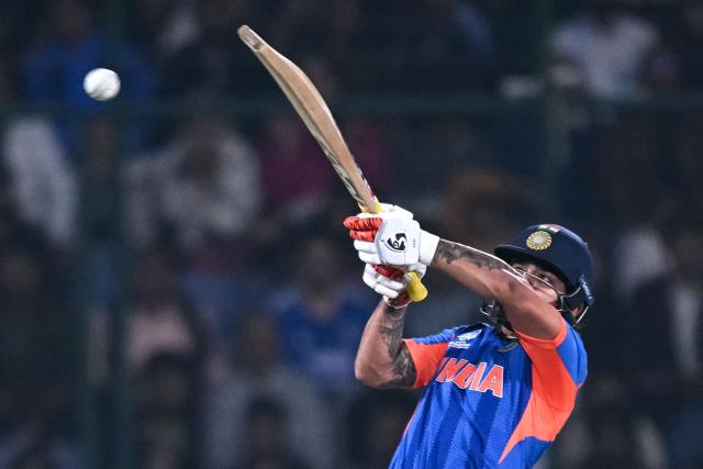 India's Ishan Kishan plays a shot during the 2026 ICC Men's T20 Cricket World Cup group stage match between India and Namibia at the Arun Jaitley Stadium in New Delhi on February 12, 2026. (Photo by Arun SANKAR / AFP)