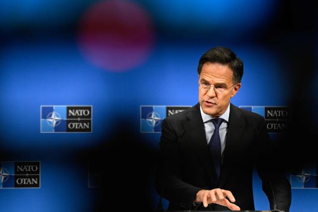 NATO Secretary General Mark Rutte speaks during a press conference on the sidelines of a defence ministers meeting of The North Atlantic Treaty Organisation (NATO) at NATO Headquarters in Brussels, on February 12, 2026. (Photo by JOHN THYS / AFP)