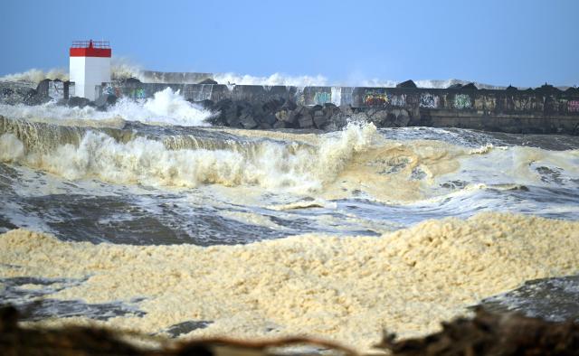 Waves crash on the La Barre beach in Anglet, as the storm named Nils hits southwestern France coastline on February 12, 2026. (Photo by Gaizka IROZ / AFP)