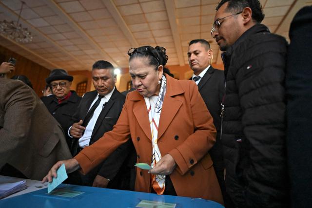 Guatemala's Attorney General, Consuelo Porras, casts her the vote during an election to choose magistrates for the Constitutional Court at the Association of Attorneys and Notaries in Guatemala City on February 12, 2026. (Photo by JOHAN ORDONEZ / AFP)