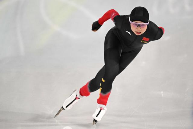 China's Tai Zhien competes in the speed skating women's 5000m during the Milano Cortina 2026 Winter Olympic Games at Milano Speed Skating Stadium in Milan on February 12, 2026. (Photo by Daniel MUNOZ / AFP)